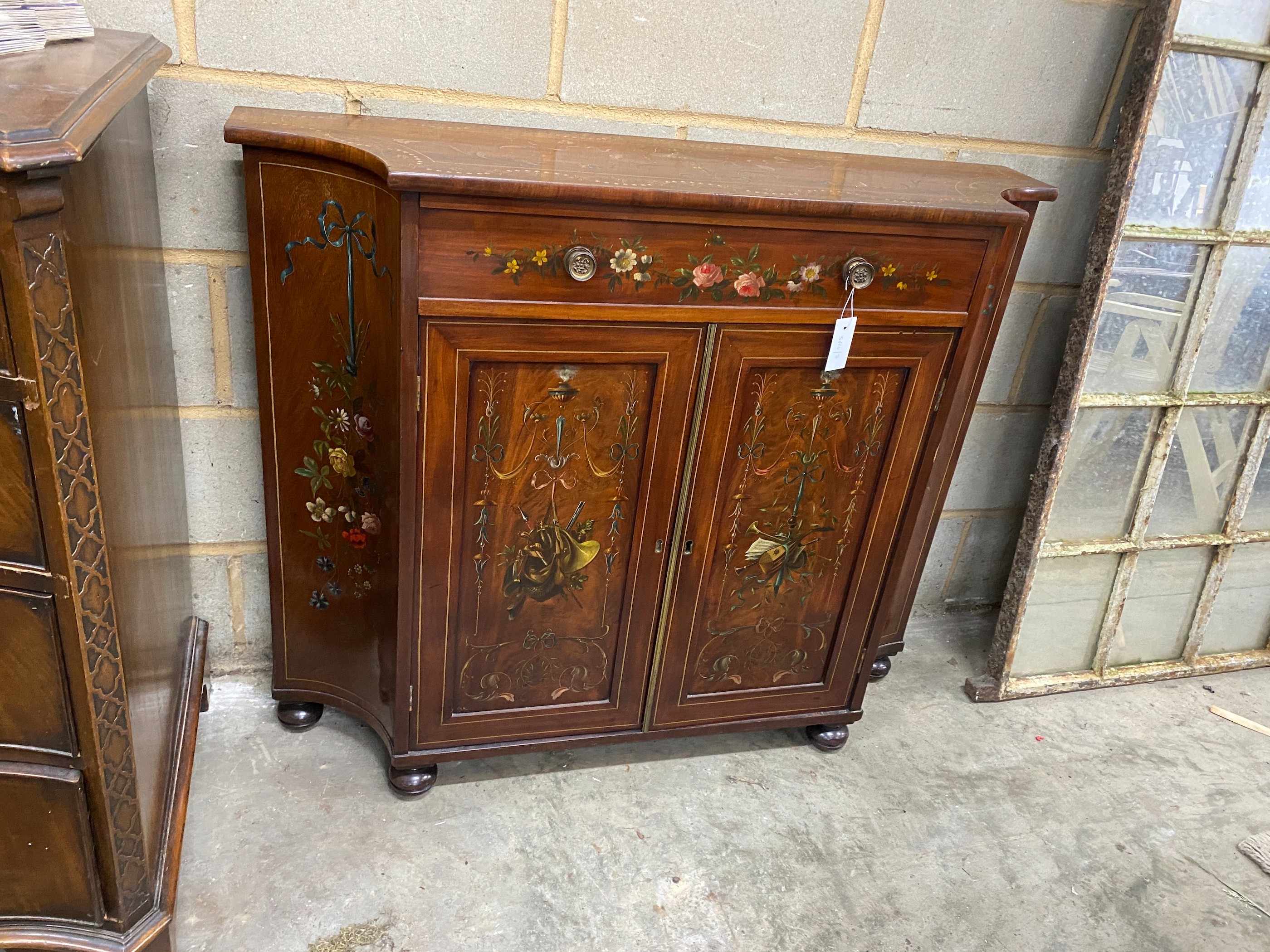 A George III and later Sheraton style painted mahogany breakfront side cabinet, width 112cm, depth 31cm, height 92cm